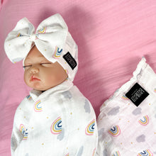 Load image into Gallery viewer, Baby rainbow printed Muslin organic cotton swaddles styled by mommy and me arabia
