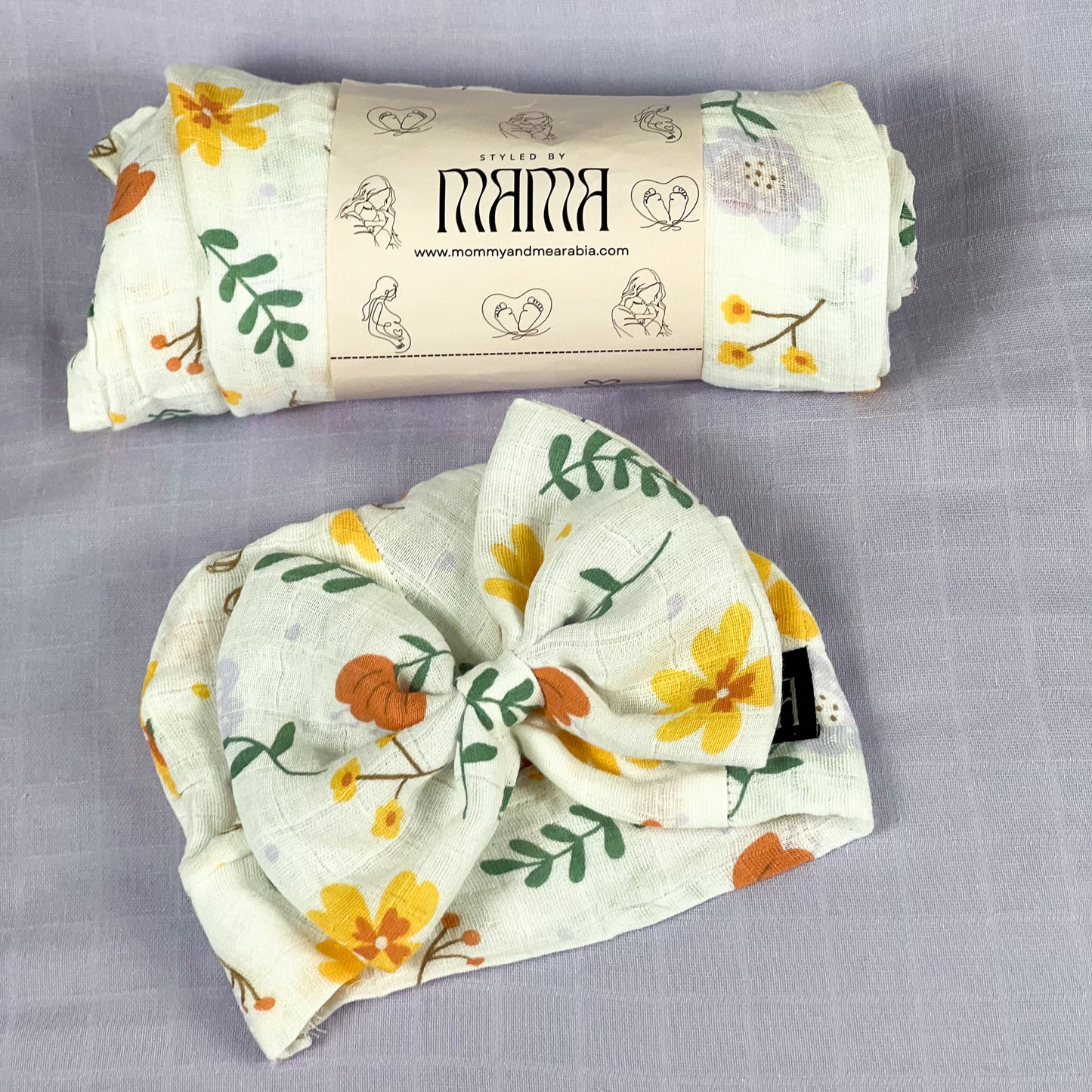 Sunshine blossom muslin organic cotton swaddles styled by mommy and me arabia