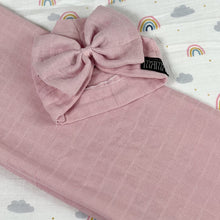 Load image into Gallery viewer, Solid rustic pink muslin organic cotton swaddles styled by mommy and me arabia
