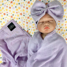 Load image into Gallery viewer, Solid baby purple muslin organic cotton swaddles styled by mommy and me arabia
