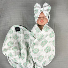 Load image into Gallery viewer, Baby green block printed Muslin organic cotton swaddles styled by mommy and me arabia
