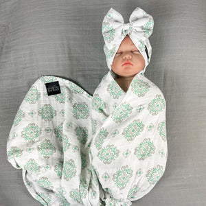 Baby green block printed Muslin organic cotton swaddles styled by mommy and me arabia