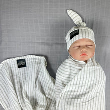 Load image into Gallery viewer, Grey stripes Muslin organic cotton swaddles styled by mommy and me arabia
