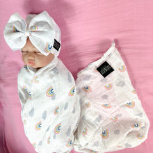 Load image into Gallery viewer, Baby rainbow printed Muslin organic cotton swaddles styled by mommy and me arabia
