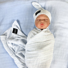 Load image into Gallery viewer, Baby blue stripes print muslin organic cotton swaddles styled by mommy and me arabia
