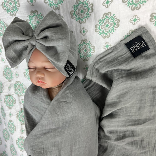 Solid moss grey muslin organic cotton swaddles styled by mommy and me arabia