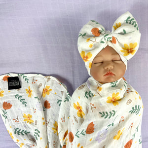 Sunshine blossom muslin organic cotton swaddles styled by mommy and me arabia