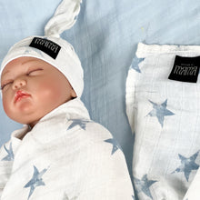 Load image into Gallery viewer, Baby blue stars print muslin organic cotton swaddles styled by mommy and me Arabia
