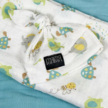 Load image into Gallery viewer, Turtle World printed Muslin organic cotton swaddles styled by mommy and me arabia
