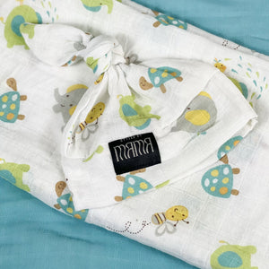 Turtle World printed Muslin organic cotton swaddles styled by mommy and me arabia