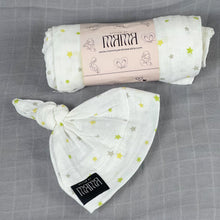 Load image into Gallery viewer, Star World Muslin organic cotton swaddles styled by mommy and me Arabia
