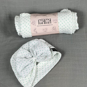 Green polka dots printed Muslin organic cotton swaddles styled by mommy and me arabia