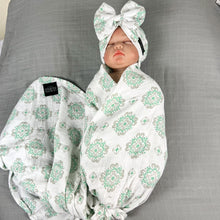 Load image into Gallery viewer, Baby green block printed Muslin organic cotton swaddles styled by mommy and me arabia
