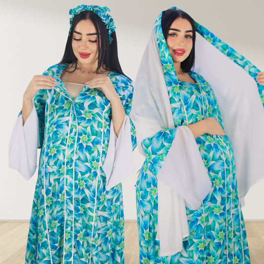 A pregnant woman wearing a blue floral maternity and nursing dress with white trim and a matching headband. The dress features a double zipper for nursing access.Maternity and breastfeeding cotton maxi dress with hijab set UAE Nursing friendly maxi dress for moms in UAE soft cotton breathable fabric.Modest maternity dress with bow and hijab for pregnancy and postpartum