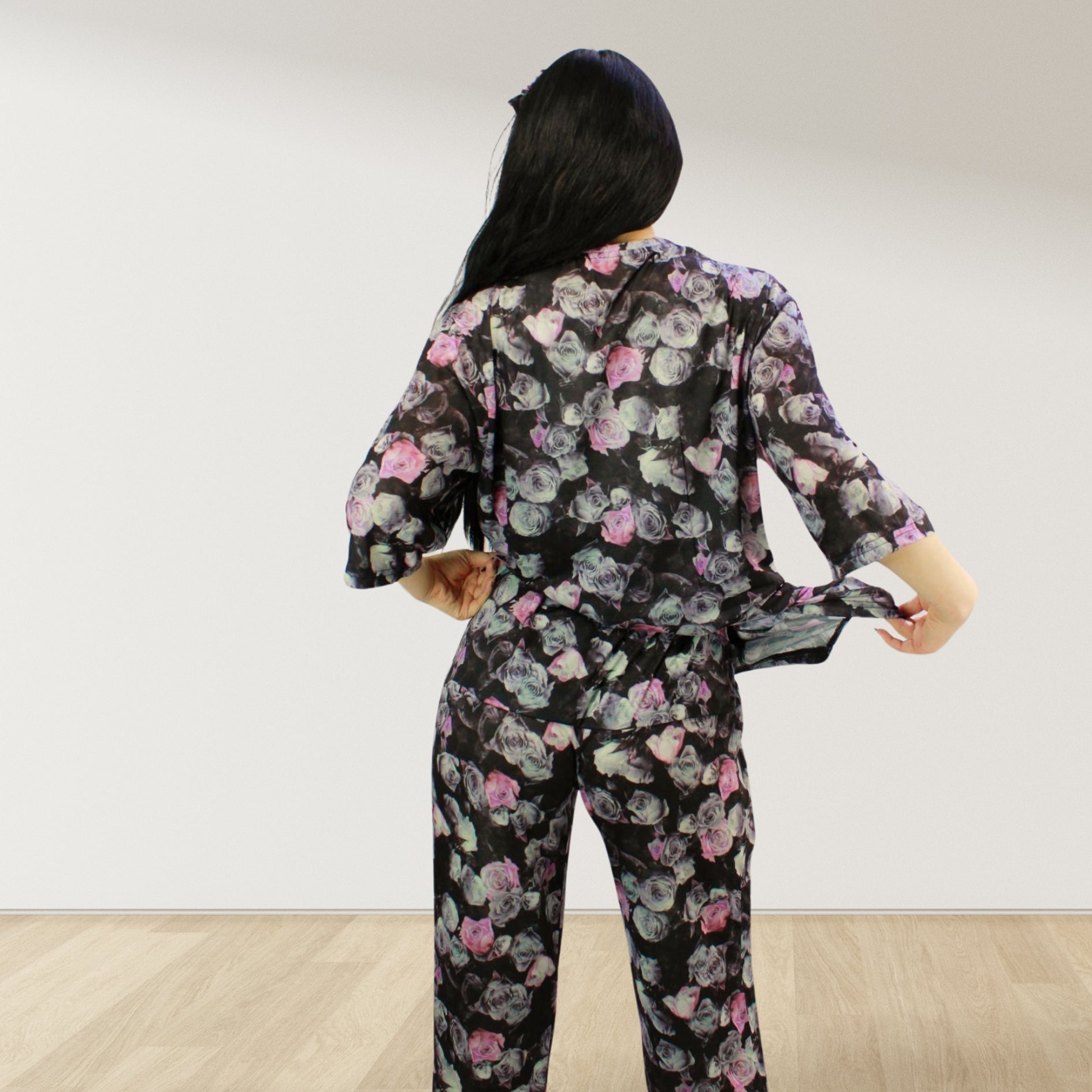 maternity nursing pajama set with baby romper breathable cottoN,mom and baby and wearing a matching pajama set with a floral pattern. The set includes a button-down top with drop shoulders and side buttons for breastfeeding, and matching romper for the baby.made in uae